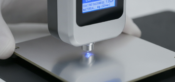 Advanced XRF scanner verifying the exact microscopic thickness of a silver metallic coating Advanced XRF scanner verifying the exact microscopic thickness of a silver metallic coating