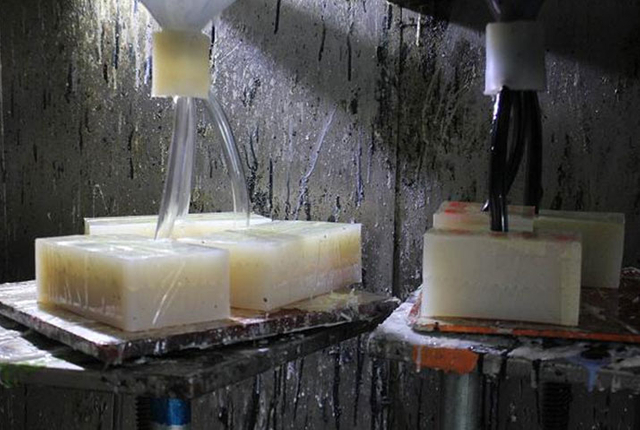 Vacuum casting material injection