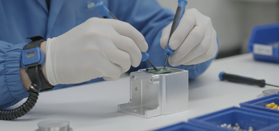 hands assembling aluminum device casing