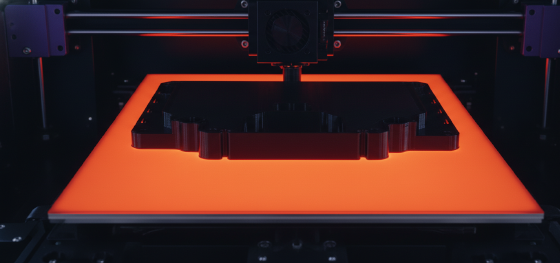 Thermal imaging showing uniform heat distribution across an industrial FDM printer bed to prevent part shrinkage