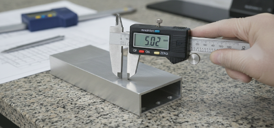 measuring early stage dimensional tolerances of raw metal hardware