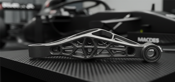 F1 racing suspension rocker featuring complex internal lattice structures manufactured exclusively via metal 3D printing